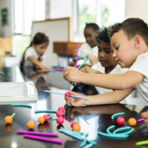 Kids learning together at elementary school.