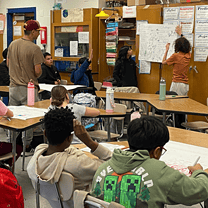 Childern are learning in a classroom.
