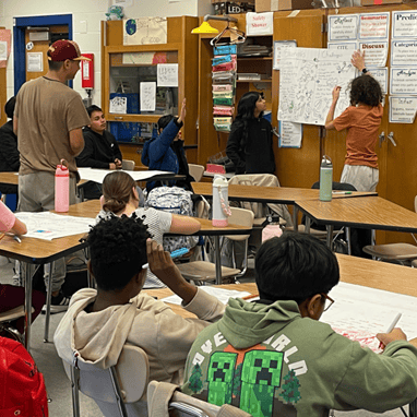 Childern are learning in a classroom.